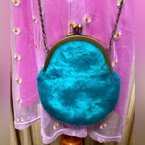Teal faux fur Miss sixty purse